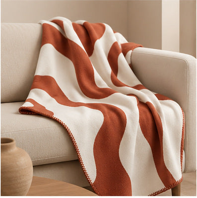 Plaid graphique terracotta et blanc – Motif organique