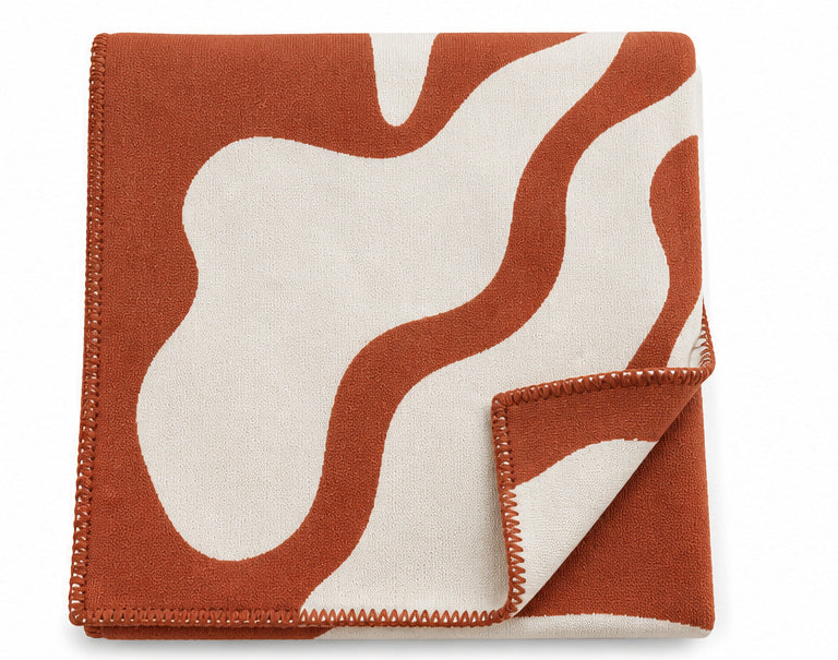 Plaid graphique terracotta et blanc – Motif organique